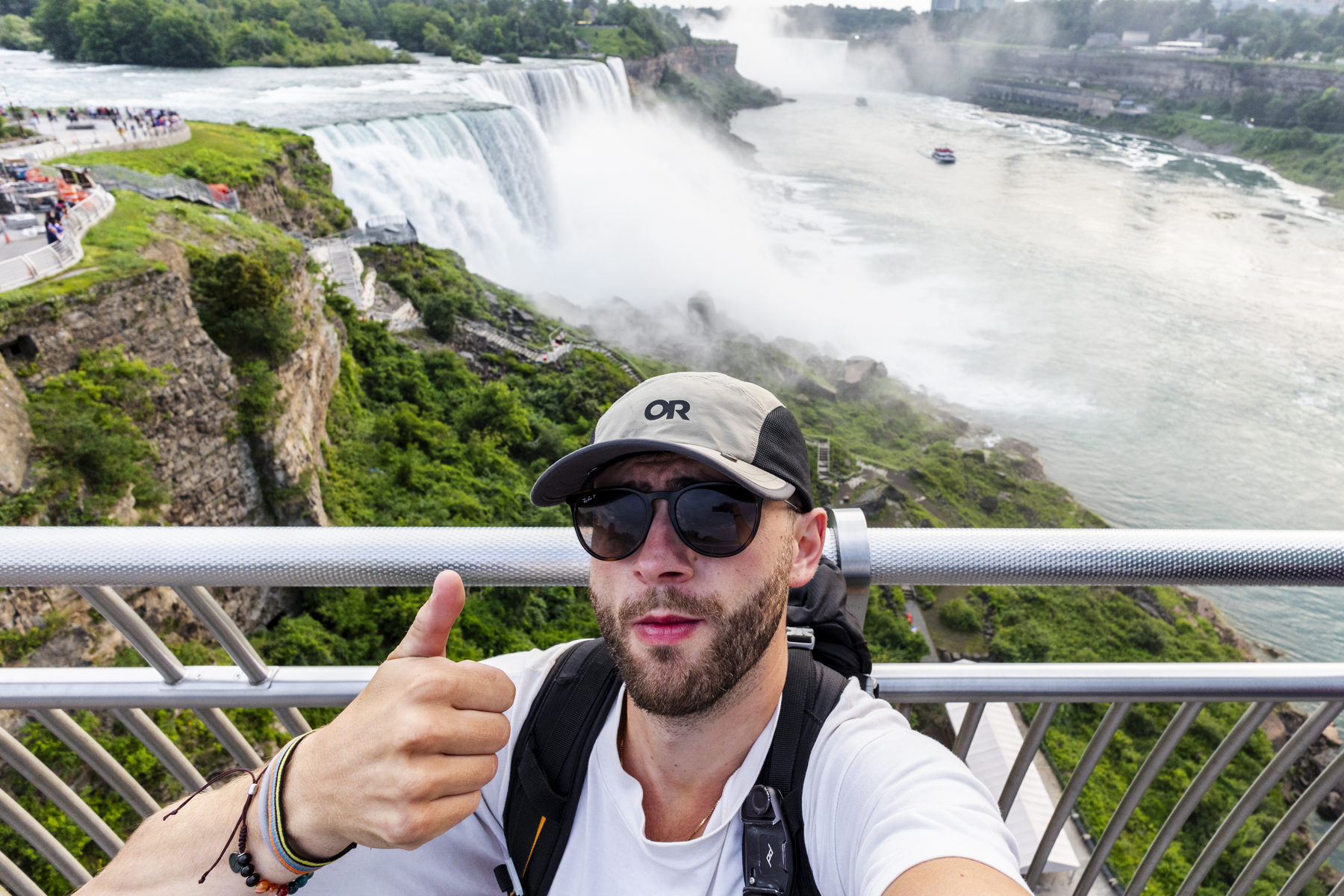 Thumbs up overlooking Niagara Falls